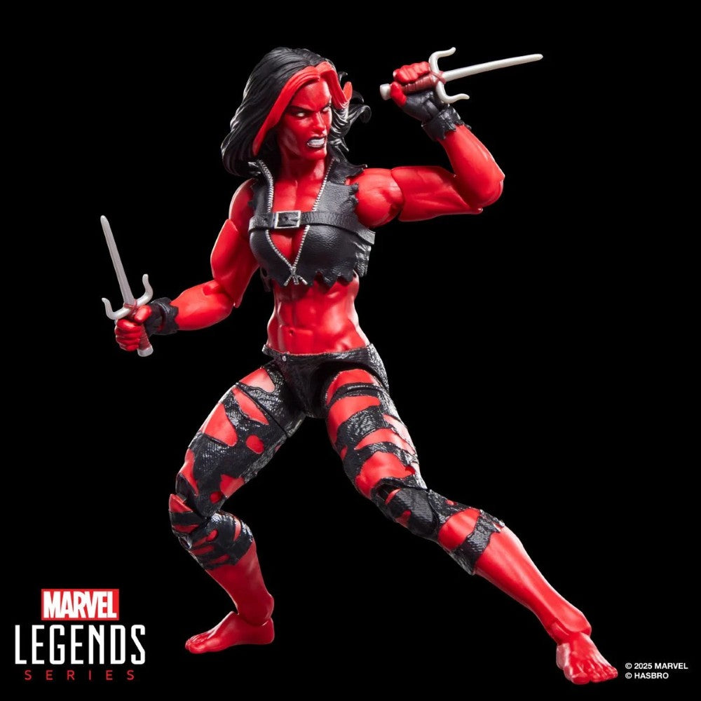Hasbro Marvel Legends 6-inch Red She-Hulk figure in battle stance with dual weapons and torn black outfit on black background