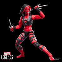 Hasbro Marvel Legends 6-inch Red She-Hulk figure in battle stance with dual weapons and torn black outfit on black background