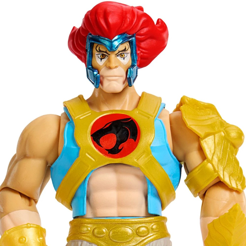 Mattel 6-inch Lion-O action figure with red hair and yellow armor from ThunderCats and Masters of the Universe