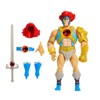 Mattel Lion-O action figure with red hair and gold armor from ThunderCats and Masters of the Universe with accessories