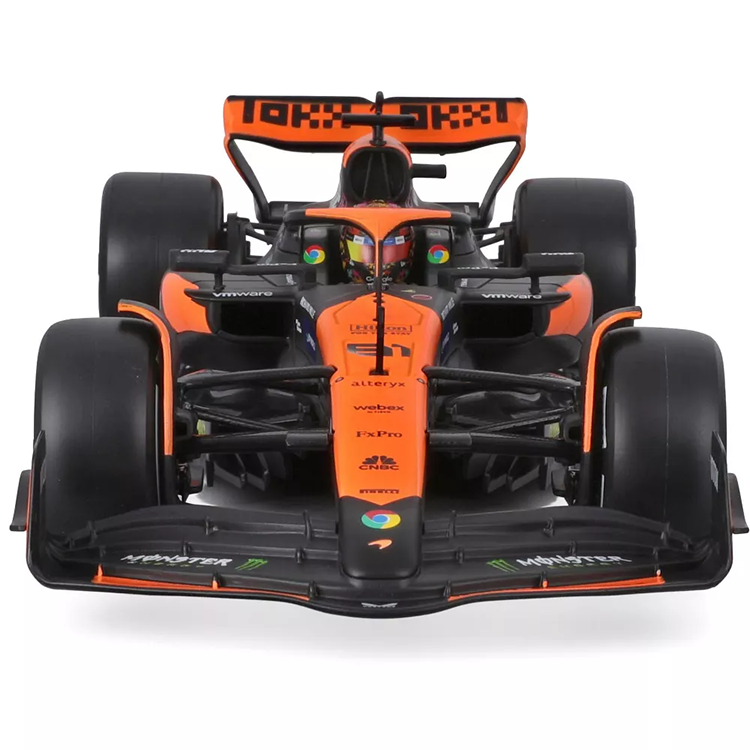 Bburago 1:43 scale die-cast McLaren MCL38 Formula 1 car with Oscar Piastri helmet and detailed livery
