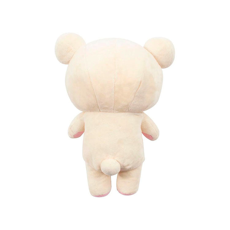 Back view of San-X Korilakkuma 13.5 inch plush with iconic red button and yellow tag