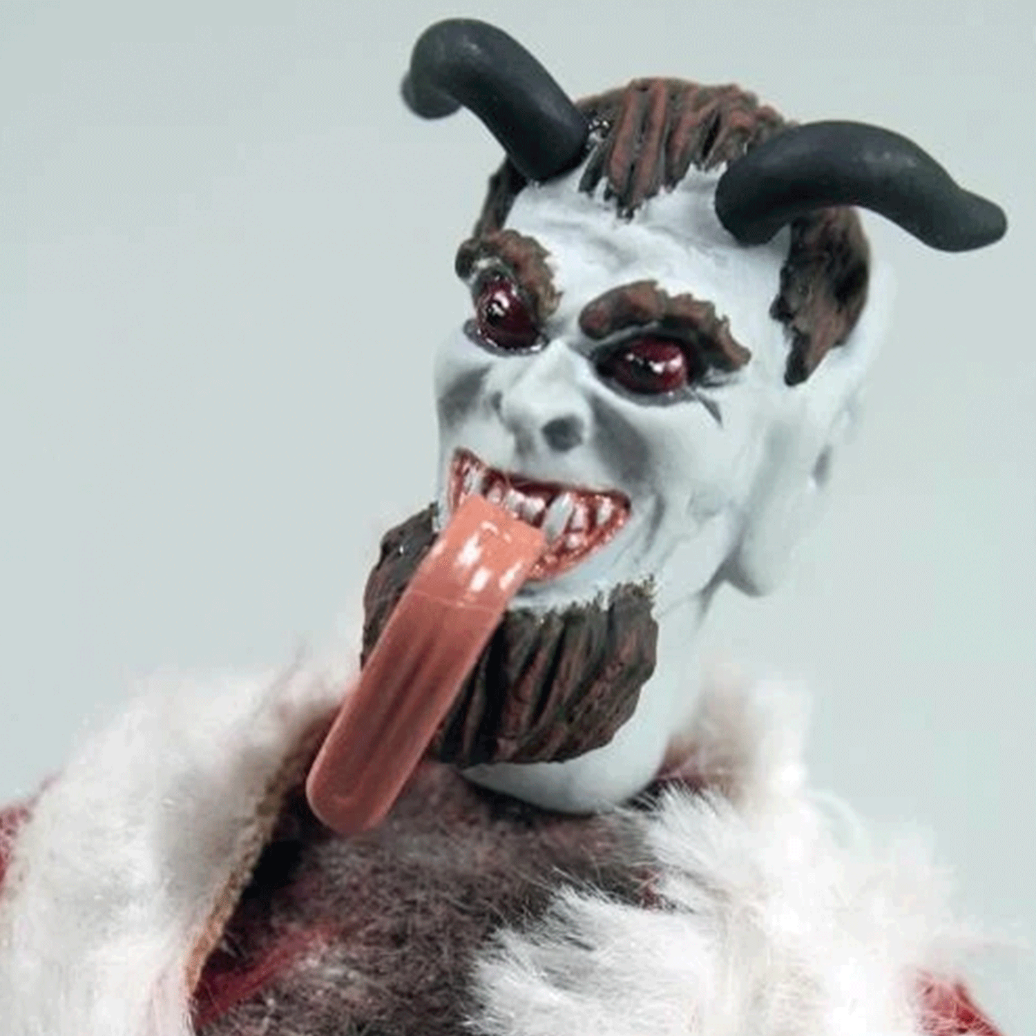 Mego 8-inch collectible figure with white face, black horns, long tongue, and detailed sculpted hair and beard