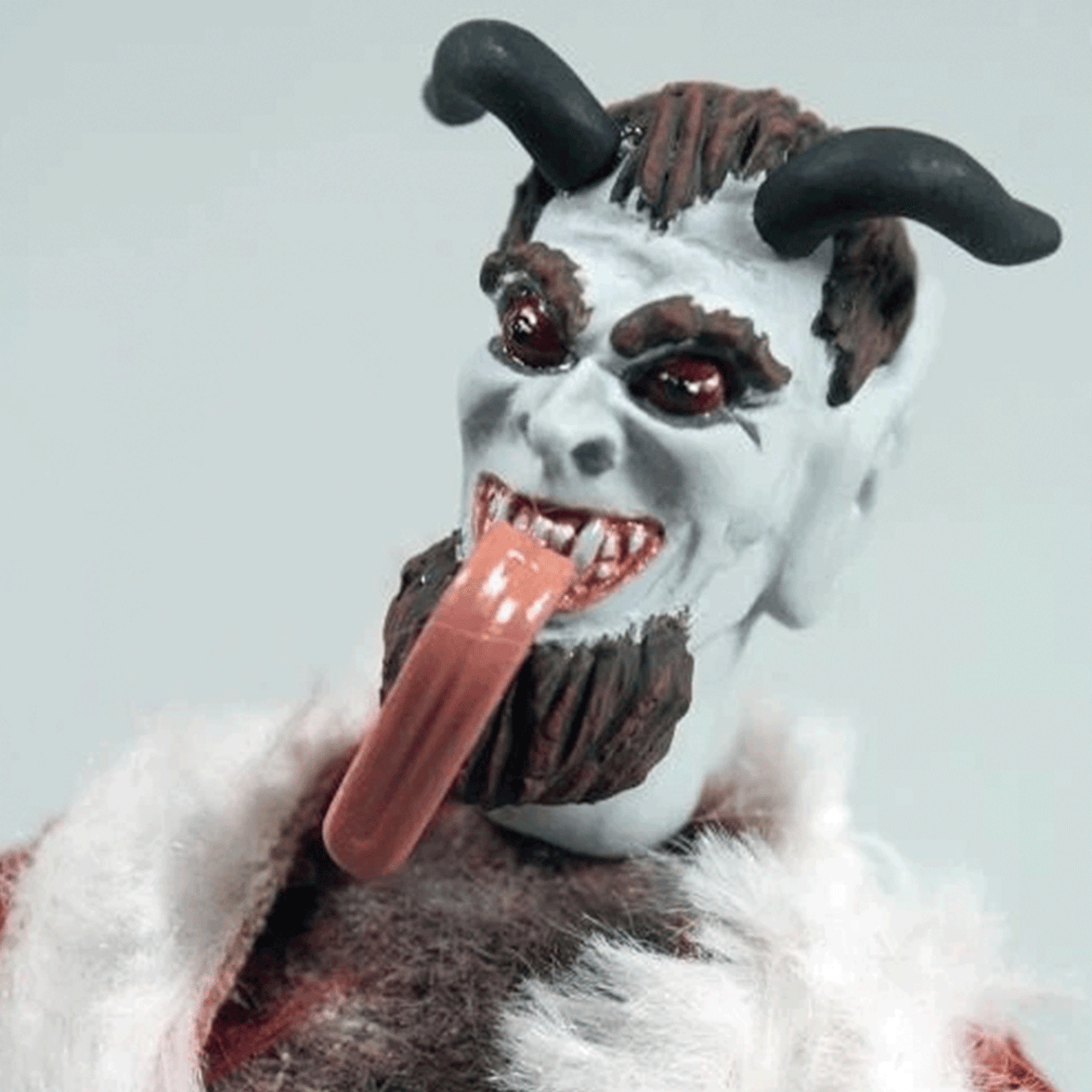 Mego 8-inch collectible figure with white face, black horns, long tongue, and detailed sculpted hair and beard
