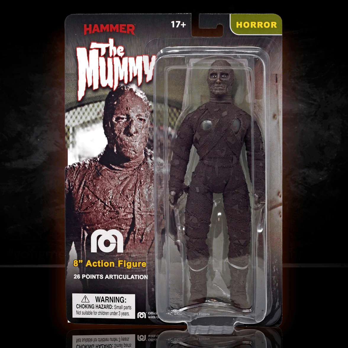 Mego 8-inch The Mummy horror figure in textured brown wrapping with articulated limbs in branded collectible packaging