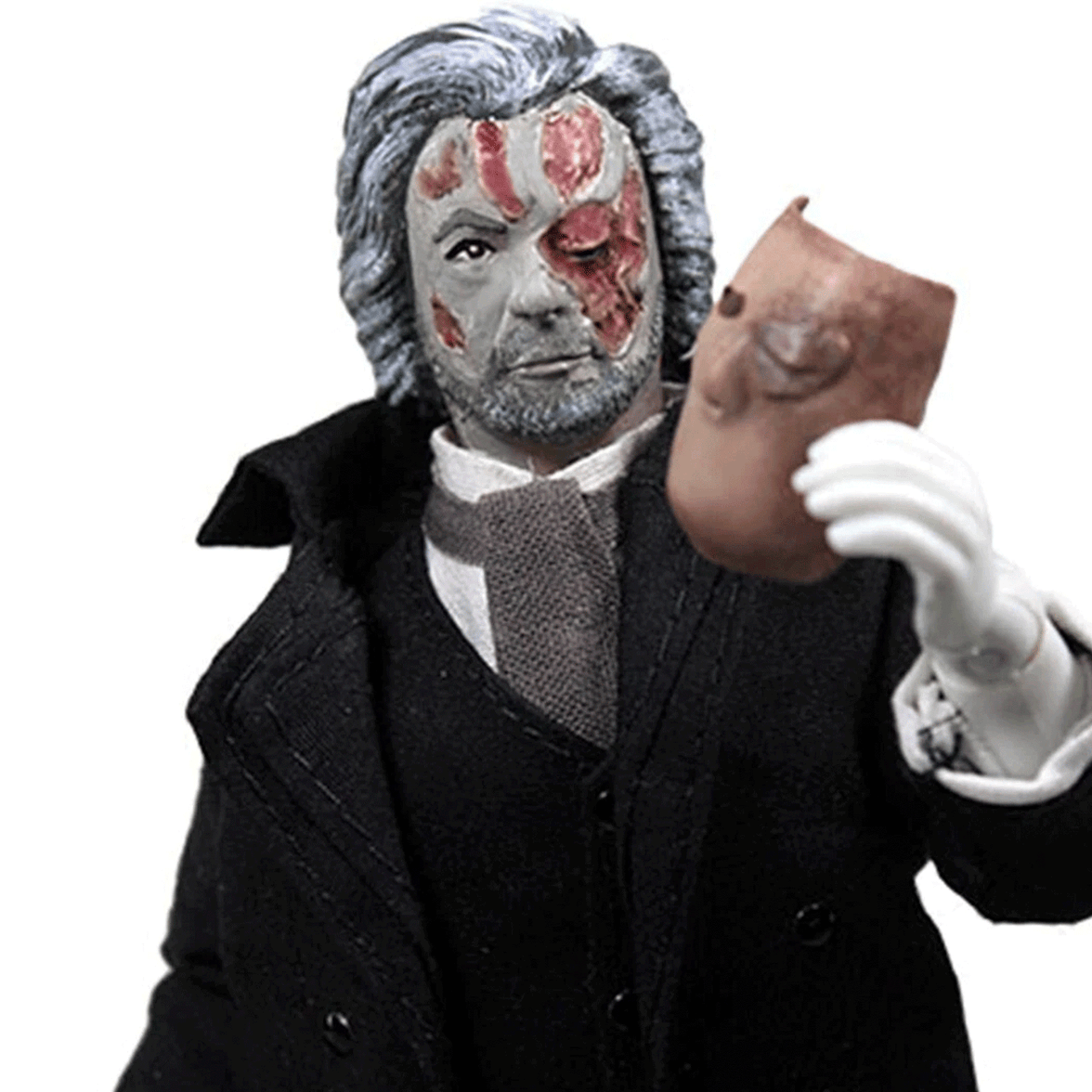 Mego 8-inch retro figure with half-masked face, gray hair, and black coat holding detailed brown mask accessory