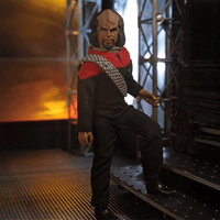 Mego 8-inch collectible action figure of a Klingon character dressed in black and red uniform with detail accessories