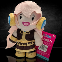 UCC 6-inch Megurine Luka plush with pink hair, yellow and blue headphones, wearing brown outfit and holding product tag