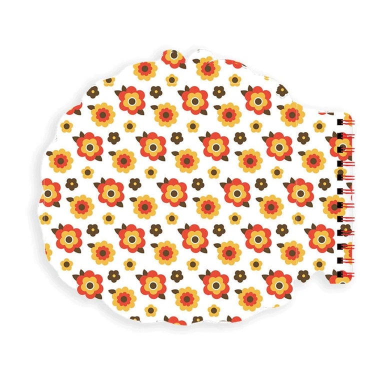 Go Figment Monchhichi die-cut spiral notebook with retro orange and yellow flower pattern on white background
