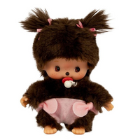 Sekiguchi Monchhichi Bebichhichi plush girl with brown fur, twin bows, pacifier, and pink heart diaper accessory