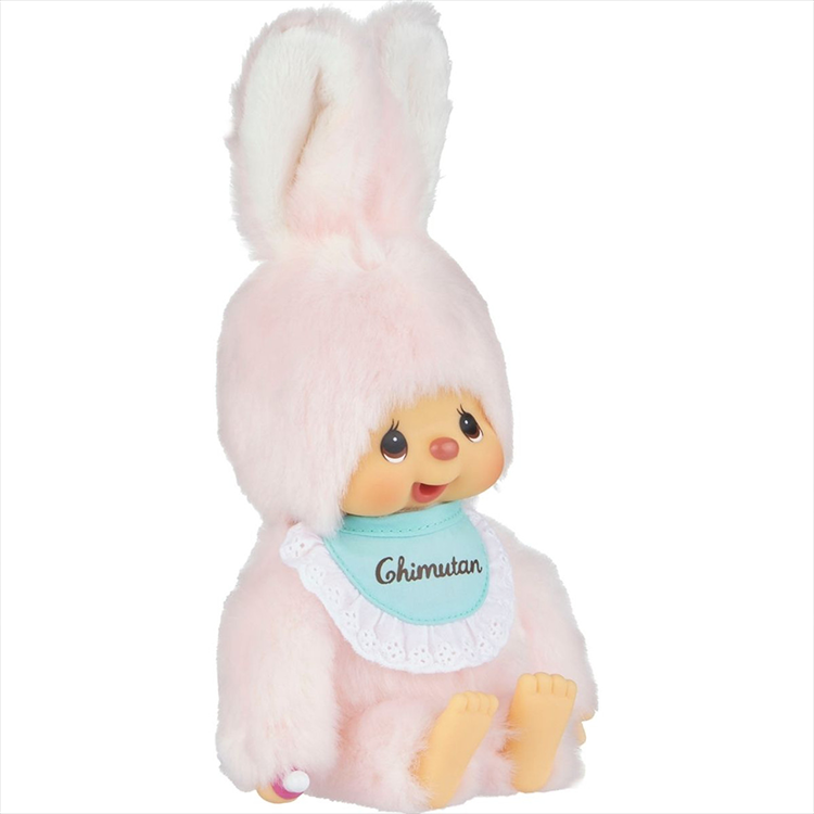 Sekiguchi Monchhichi Chimutan plush in pastel pink with blue bib sitting and smiling, 8.5 inches tall collectible toy