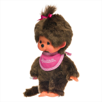 Sekiguchi Monchhichi classic girl plush with pink bib, thumb in mouth, soft fur, and bow on head, 8 inches tall.