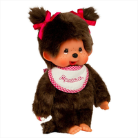 Sekiguchi Monchhichi plush girl with pink bows and white pink bib standing with thumb in mouth collectible toy