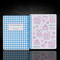 Go Figment Monchhichi & Chimutan spiral journal with blue checkered left page and pink character pattern on right page