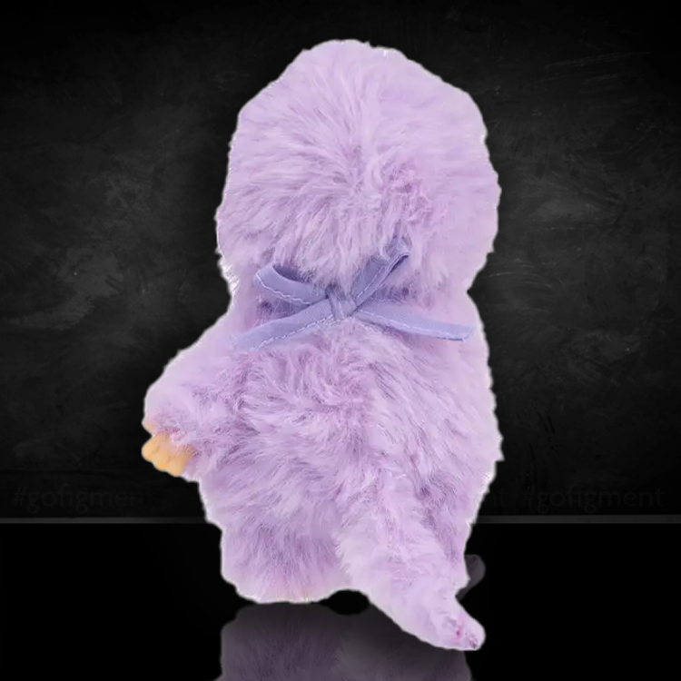 Sekiguchi Monchhichi royal purple plush with soft fur, signature pacifier, and detailed plastic features.