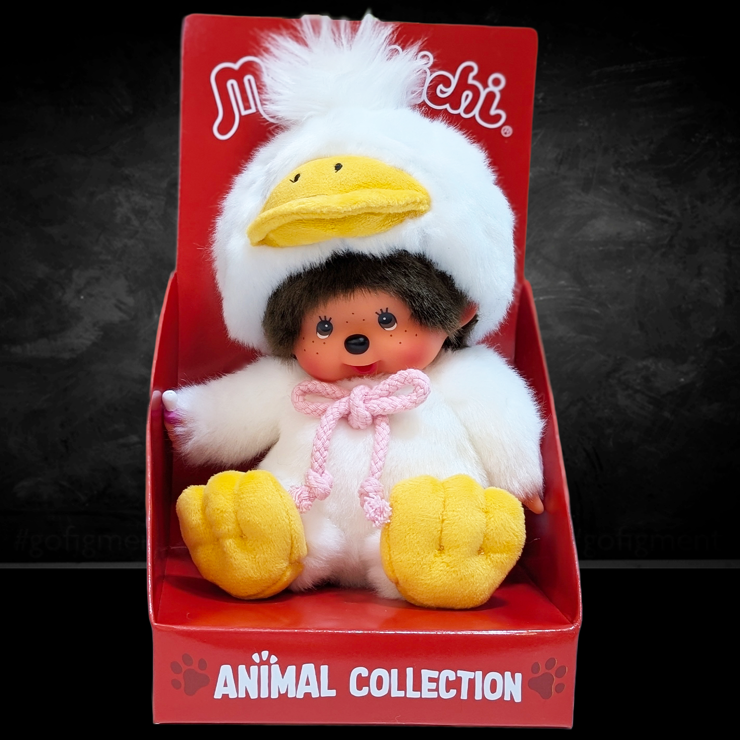 Official Sekiguchi Monchhichi 8-inch Animal Friends Duck plush doll wearing a yellow duckling hood, often searched as Monchichi.