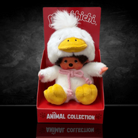 Official Sekiguchi Monchhichi 8-inch Animal Friends Duck plush doll wearing a yellow duckling hood, often searched as Monchichi.