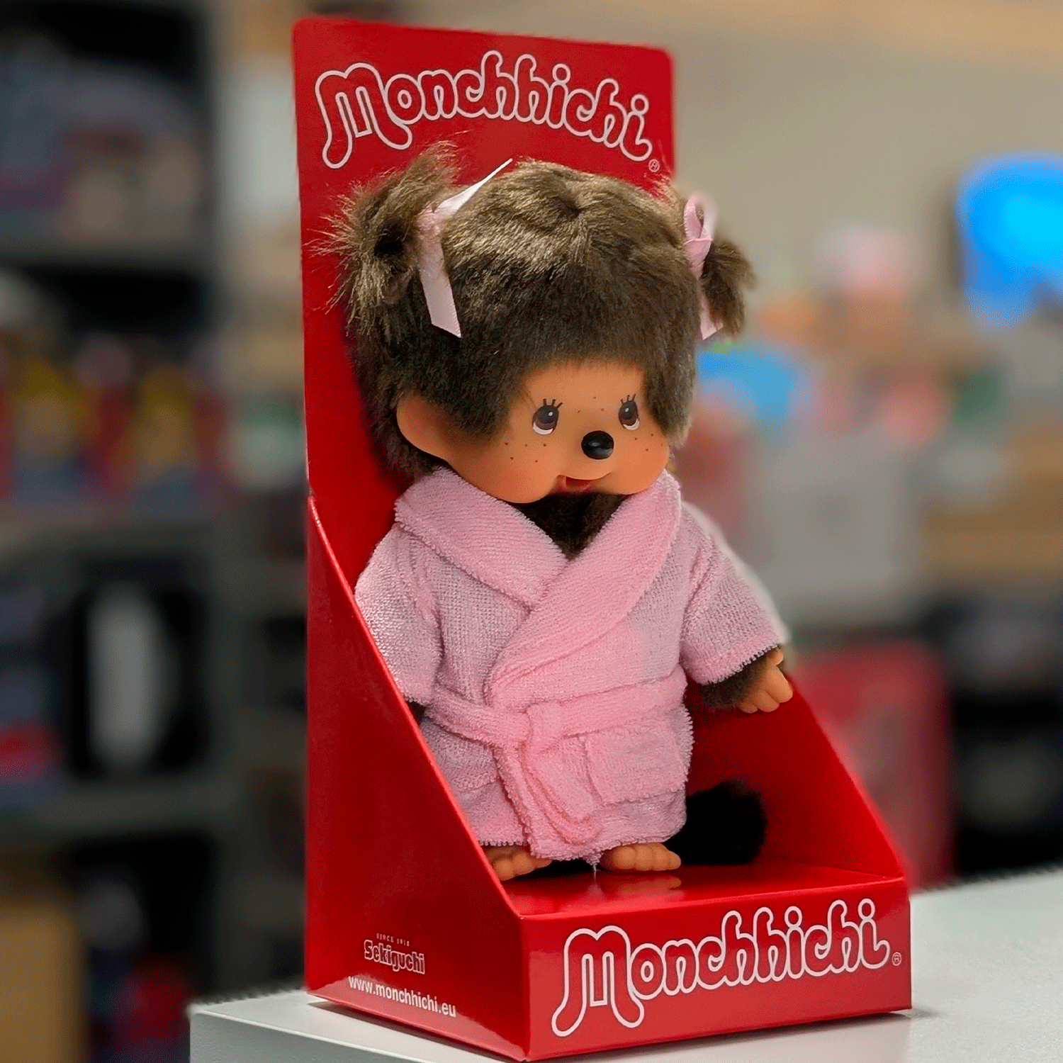 Sekiguchi Monchhichi 8 inch girl plush doll wearing pink bathrobe in original red display packaging