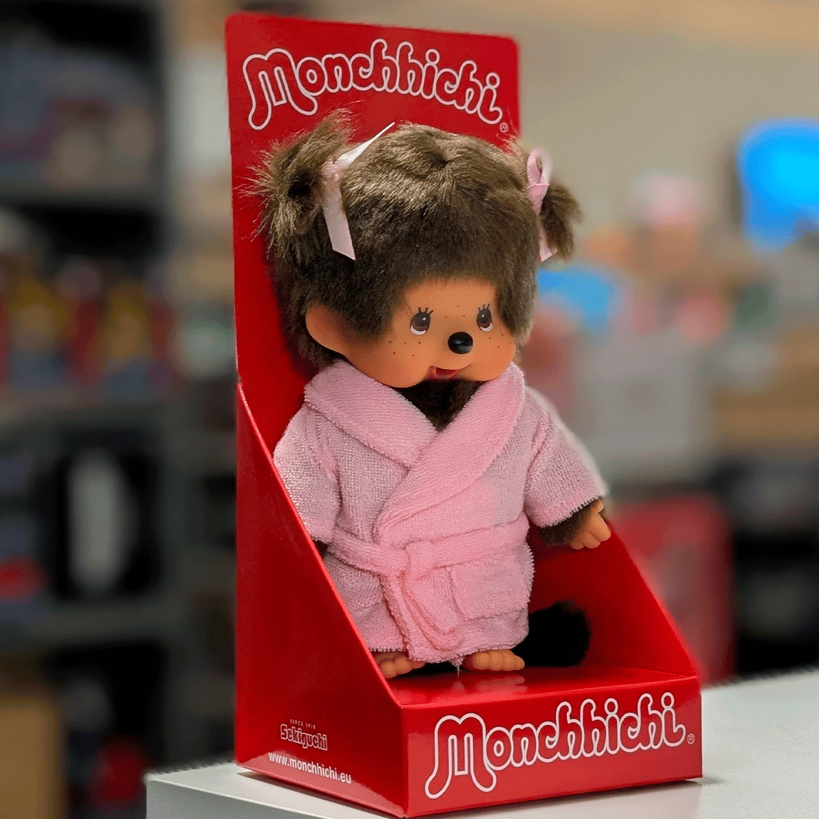 Sekiguchi Monchhichi 8 inch girl plush doll wearing pink bathrobe in original red display packaging