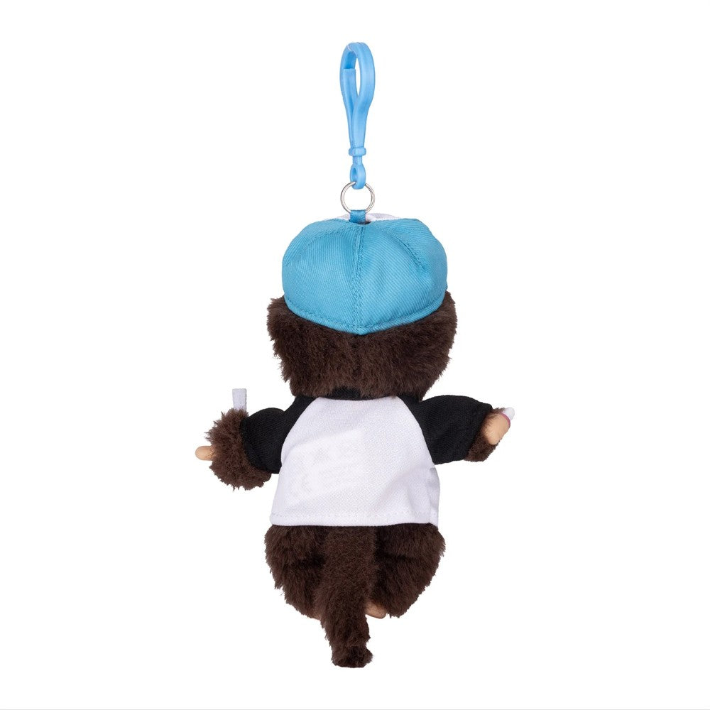 Back view of a brown plush monkey keychain wearing a blue cap and white shirt