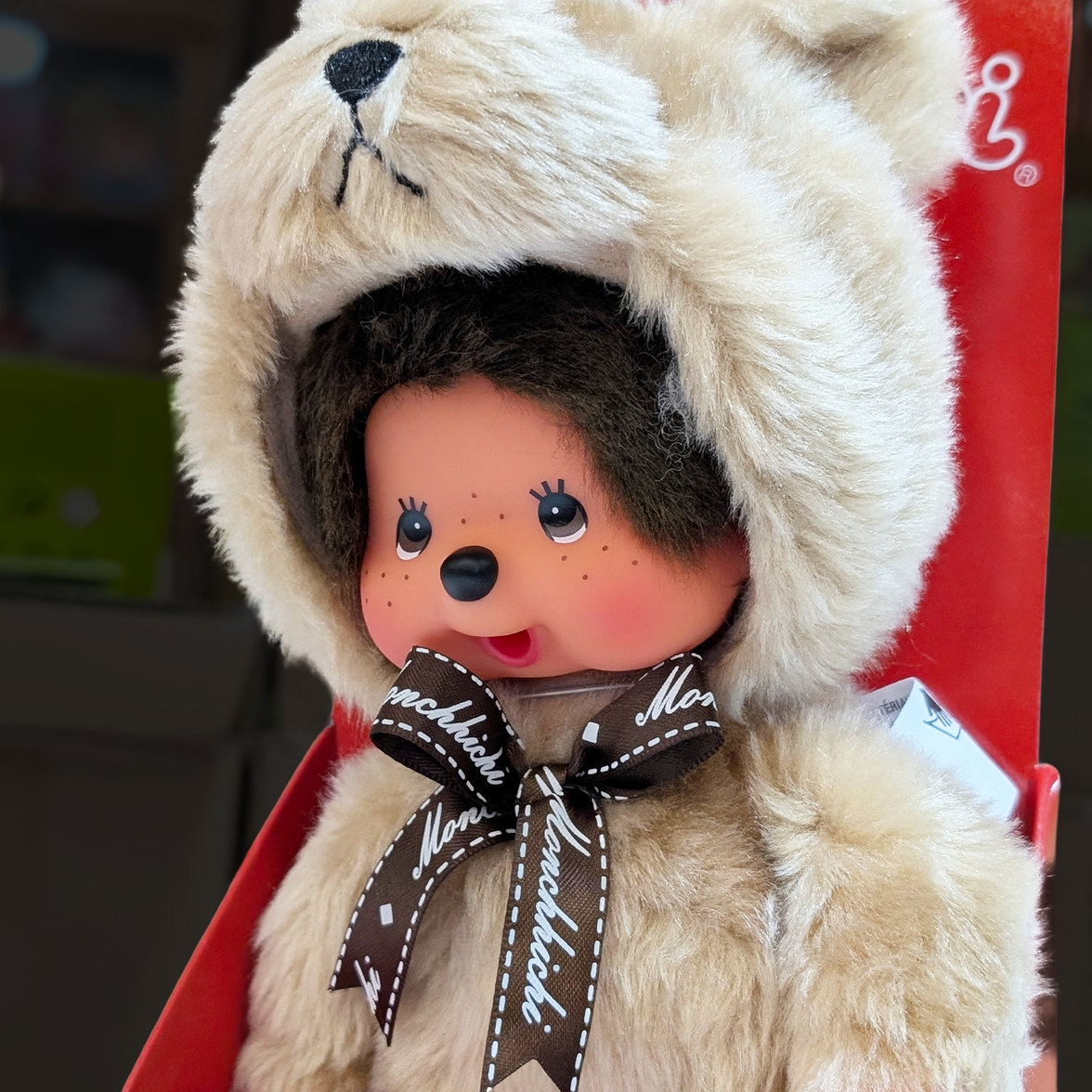 Official Sekiguchi Monchhichi 8-inch Animal Friends Teddy Bear plush doll wearing a brown bear hood, often searched as Monchichi.