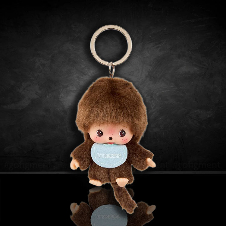 Sekiguchi Monchhichi Bebichhichi plush keychain with big head and soft brown fur on black background
