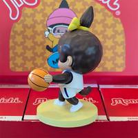 Sekiguchi Girl Monchhichi basketball player vinyl figure in white jersey with yellow hair ribbon, dribbling ball on yellow base.