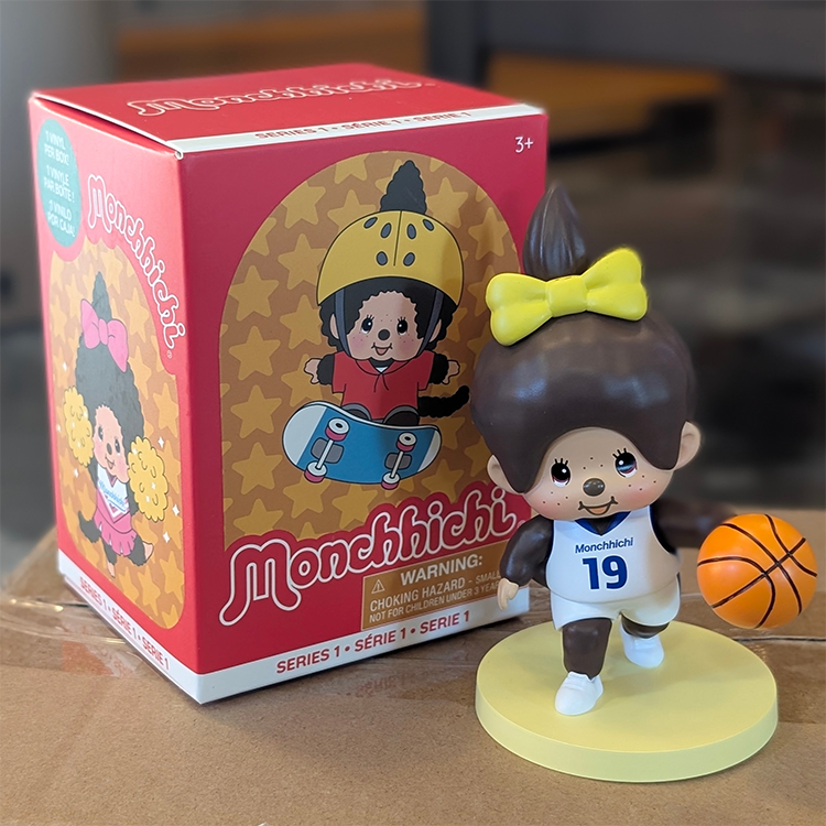 Sekiguchi Monchhichi Girl Basketball Player vinyl figure with yellow bow dribbling a basketball on yellow base
