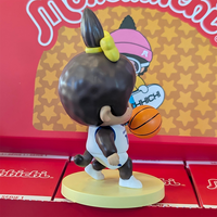 Sekiguchi Girl Monchhichi vinyl figure dribbling basketball on yellow stand from Sports Series 1 collection