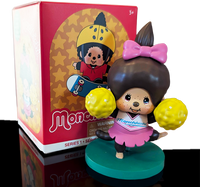 Sekiguchi Girl Monchhichi cheerleader figure in pink outfit with yellow pom-poms on green stand from Sports Series 4.