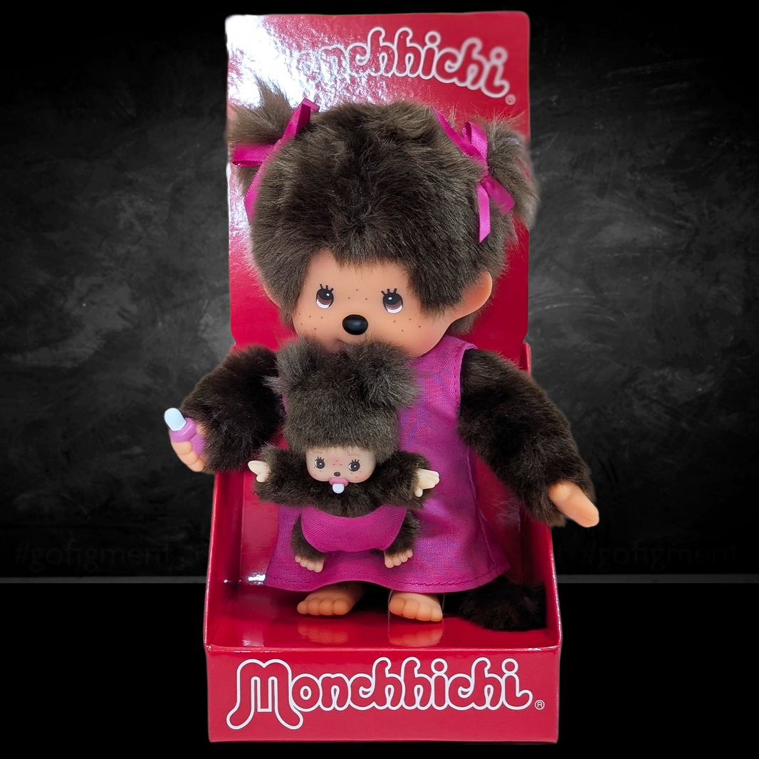 Official Sekiguchi Monchhichi 8-inch Mothercare pink plush doll holding a matching baby monkey, often spelled Monchichi.