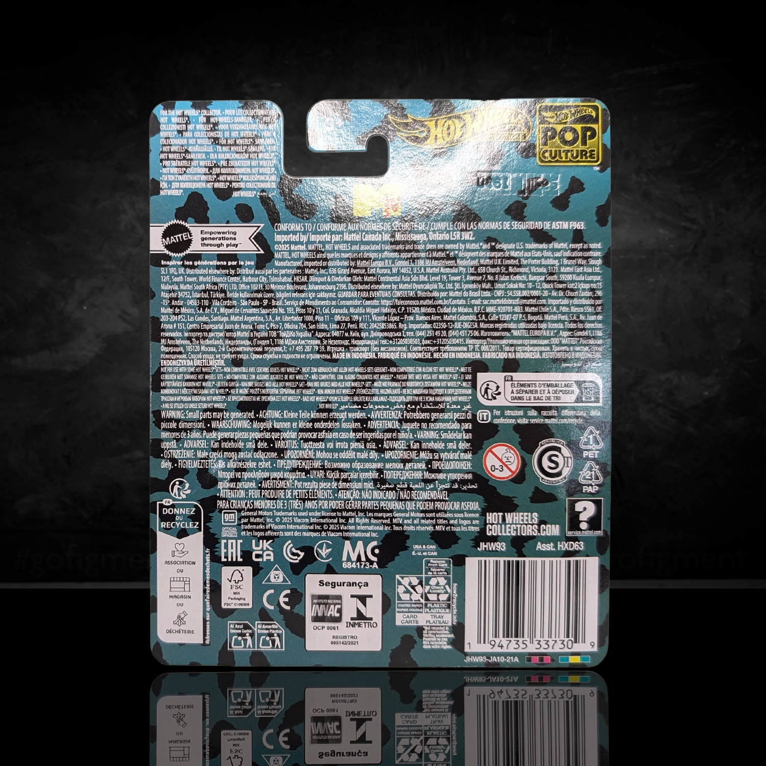 Packaging back featuring detailed warnings and branding for 84 Corvette Mtv Hot Wheels Premium Pop Culture Diecast Car Music Television by Mattel