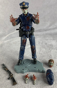 Zombie police officer action figure with accessories on a gray background