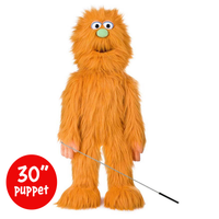 Orange furry puppet with a control rod on a white background