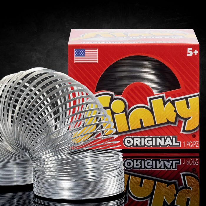 Classic Metal Slinky toy by Just Play with vintage style packaging and shiny coil design for nostalgic collectors.
