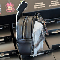 Side view of black Loungefly mini backpack bag charm with Skeleton Goofy design and zipper detail