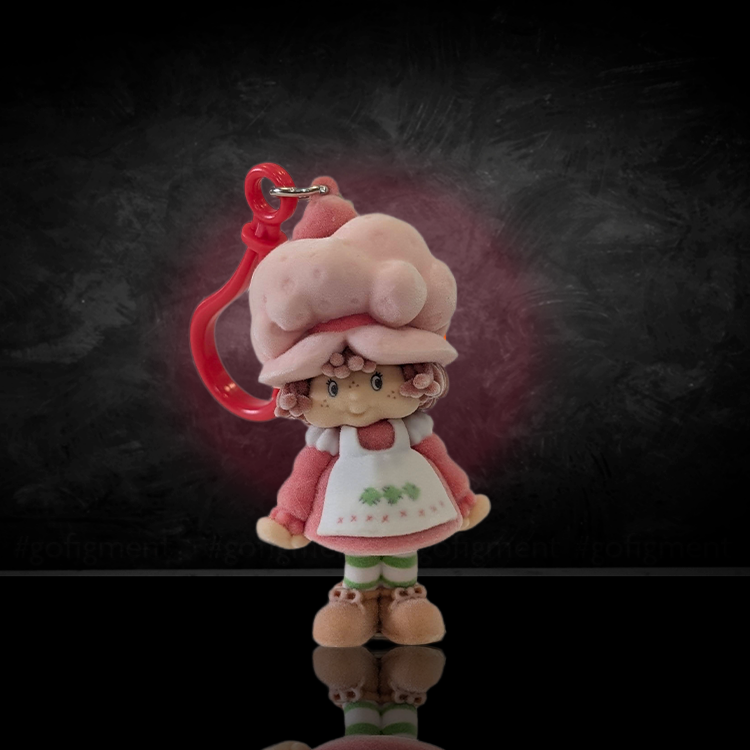 UCC World of Strawberry Shortcake soft flocked mini figure clip wearing pink hat and dress with red clip attachment