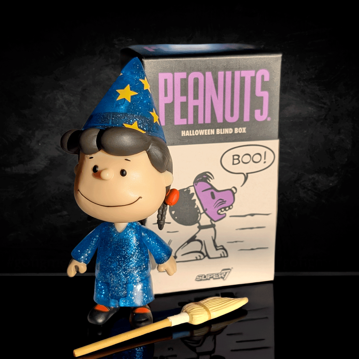 Peanuts Halloween ReAction Figure by Go Figment dressed as a wizard with box and broomstick on black background