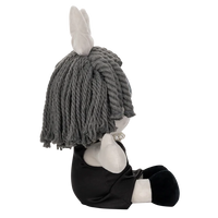 Glitch Ragatha Noir plush doll sitting sideways with gray yarn hair, pearl necklace, black dress, and white ears