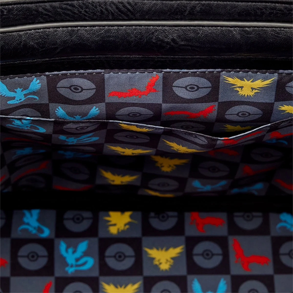 Interior pattern of Articuno Moltres Zapdos Pokémon Legendary Birds Loungefly Mini-Backpack with colorful legendary bird silhouettes and Poké Balls