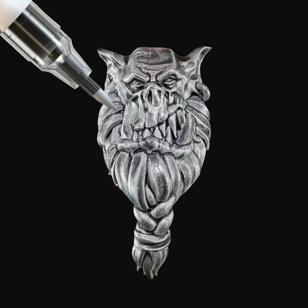 Polished Silver Army Painter Speedpaint Marker - One-Coat Metallic Miniature Paint SM1017P adding metallic highlights on fantasy miniature face by Army Painter