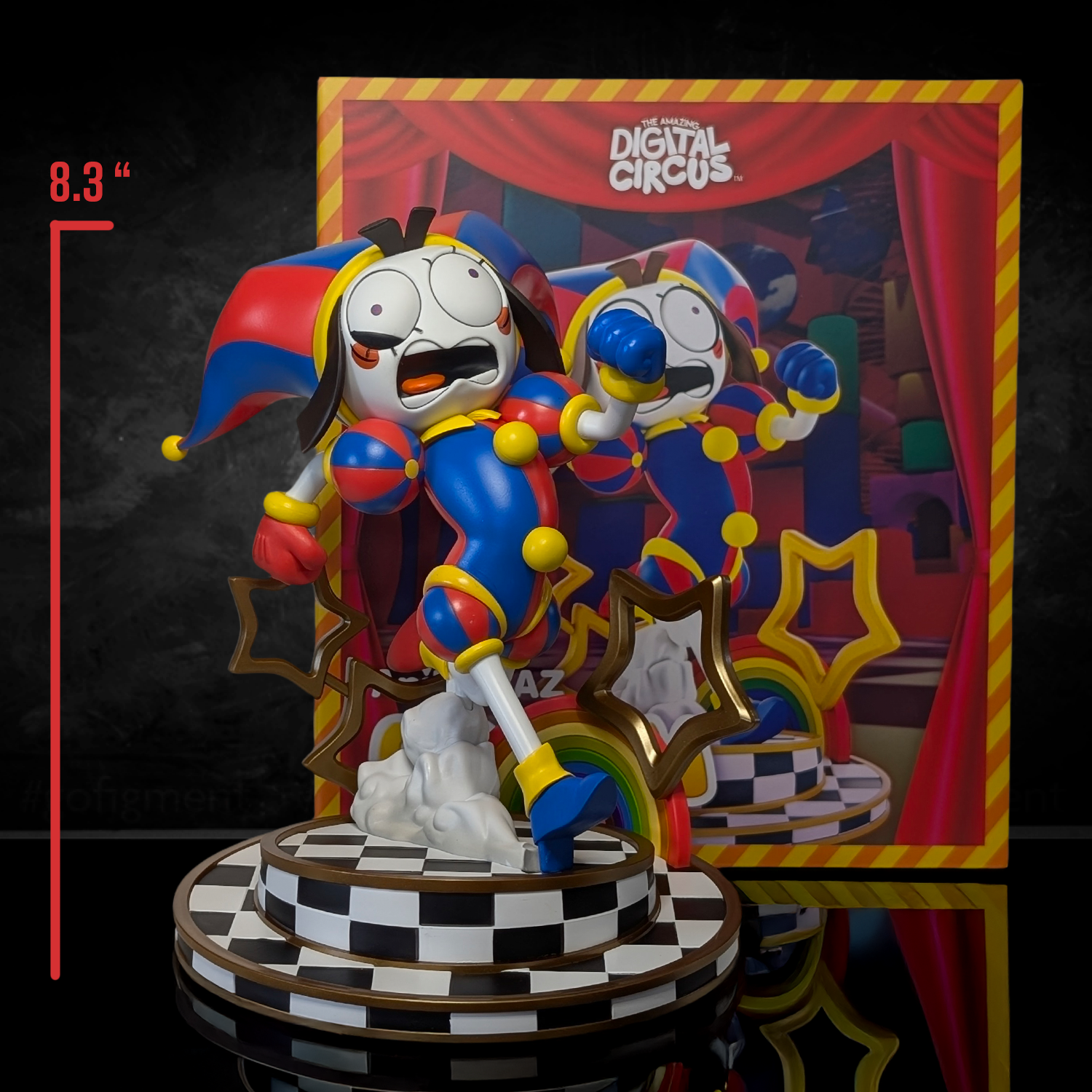 Colorful Digital Circus character figure in jester costume on checkered base with decorative stars and rainbow background panel.