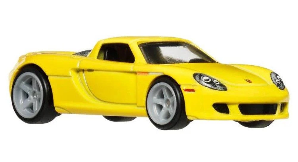 Hot Wheels Premium 1:64 scale yellow Porsche Carrera GT die-cast model by Mattel angled view
