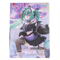 Anime-style figure of a girl with teal hair in twin tails wearing a punk-inspired black outfit with fishnet stockings