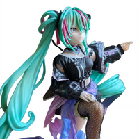 Anime-style collectible figure with vibrant teal hair, black outfit, and detailed fishnet stocking pose