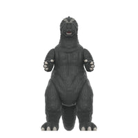 Front view of Super7 Godzilla 1964 ReAction figure with distinctive prominent eyebrow detail and articulated limbs.
