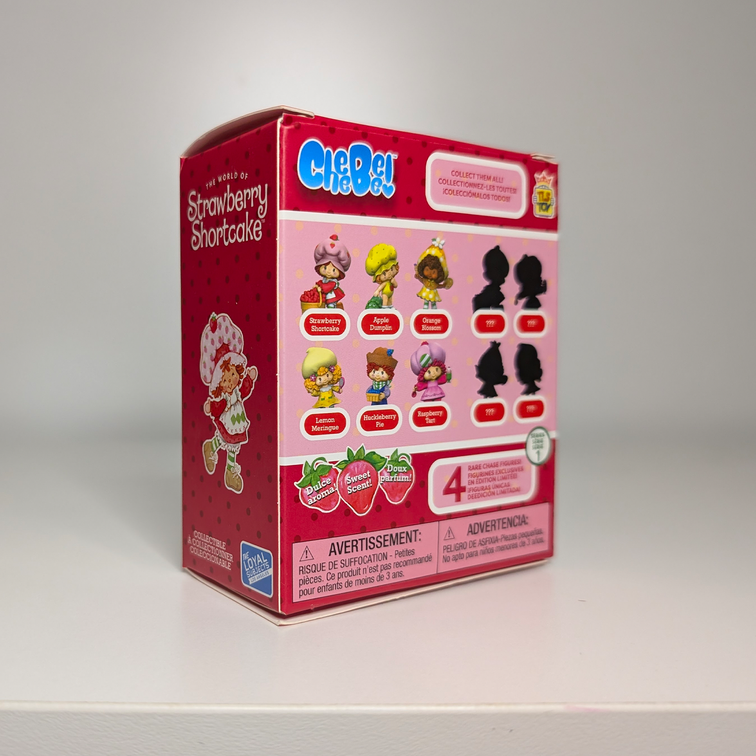 Raspberry Tart Translucent 2.5" Strawberry Shortcake Cheebee Figure by Loyal Subjects in red collectible packaging with character lineup.