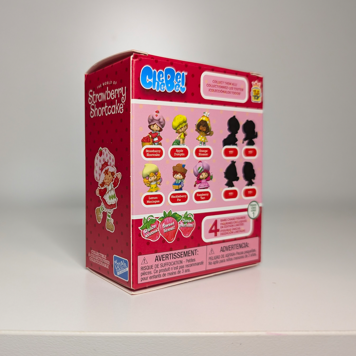 Raspberry Tart Translucent 2.5" Strawberry Shortcake Cheebee Figure by Loyal Subjects in red collectible packaging with character lineup.