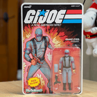 Super7 Snake Eyes Red Glow 3.75-inch ReAction+ figure in arctic outfit with weapons in retro blister card packaging