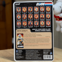 Super7 GI Joe Arctic Scarlett figure card back featuring character bio and vintage style Cobra battle artwork